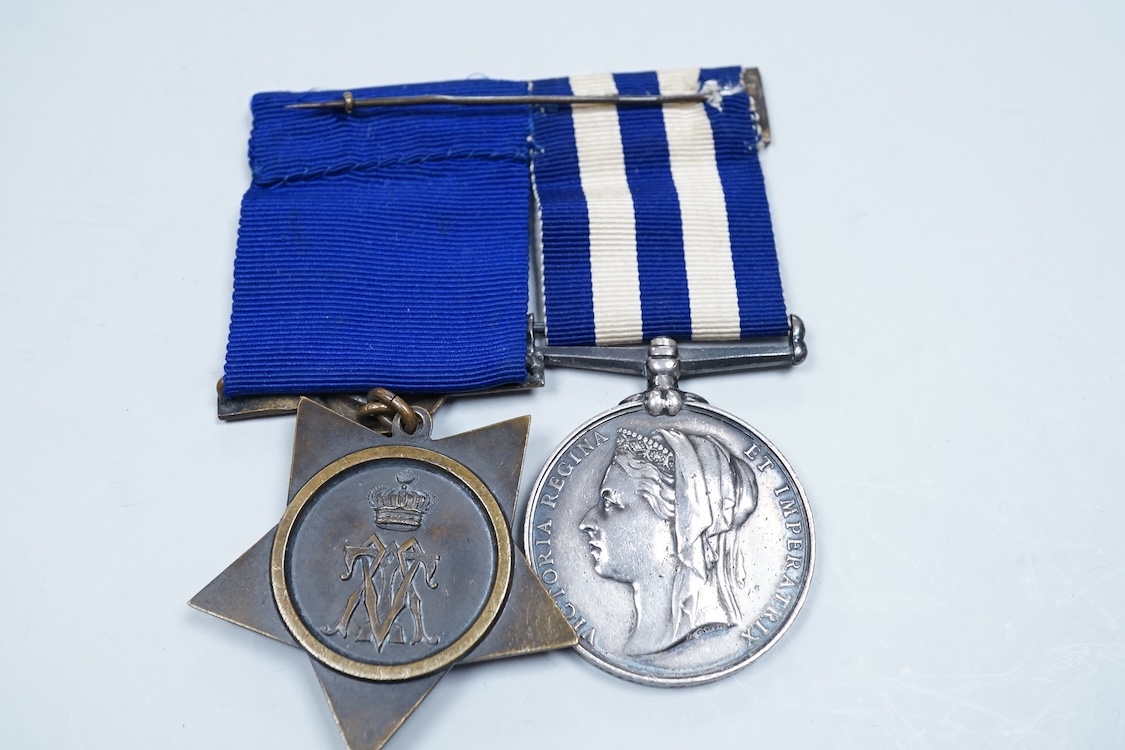 An Egyptian campaign pair awarded to Midshipman C.E.E. Carey RN, comprising the Egypt campaign medal 1882 and the Khedives Star, Khedive's star 1882 unnamed, Associated cased set of chart instruments the lid with plaque